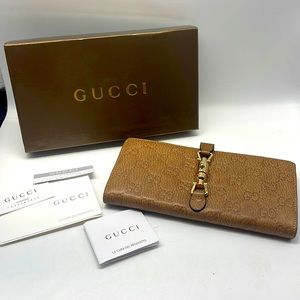 Gucci Tan Leather Embossed Logo Large Wallet